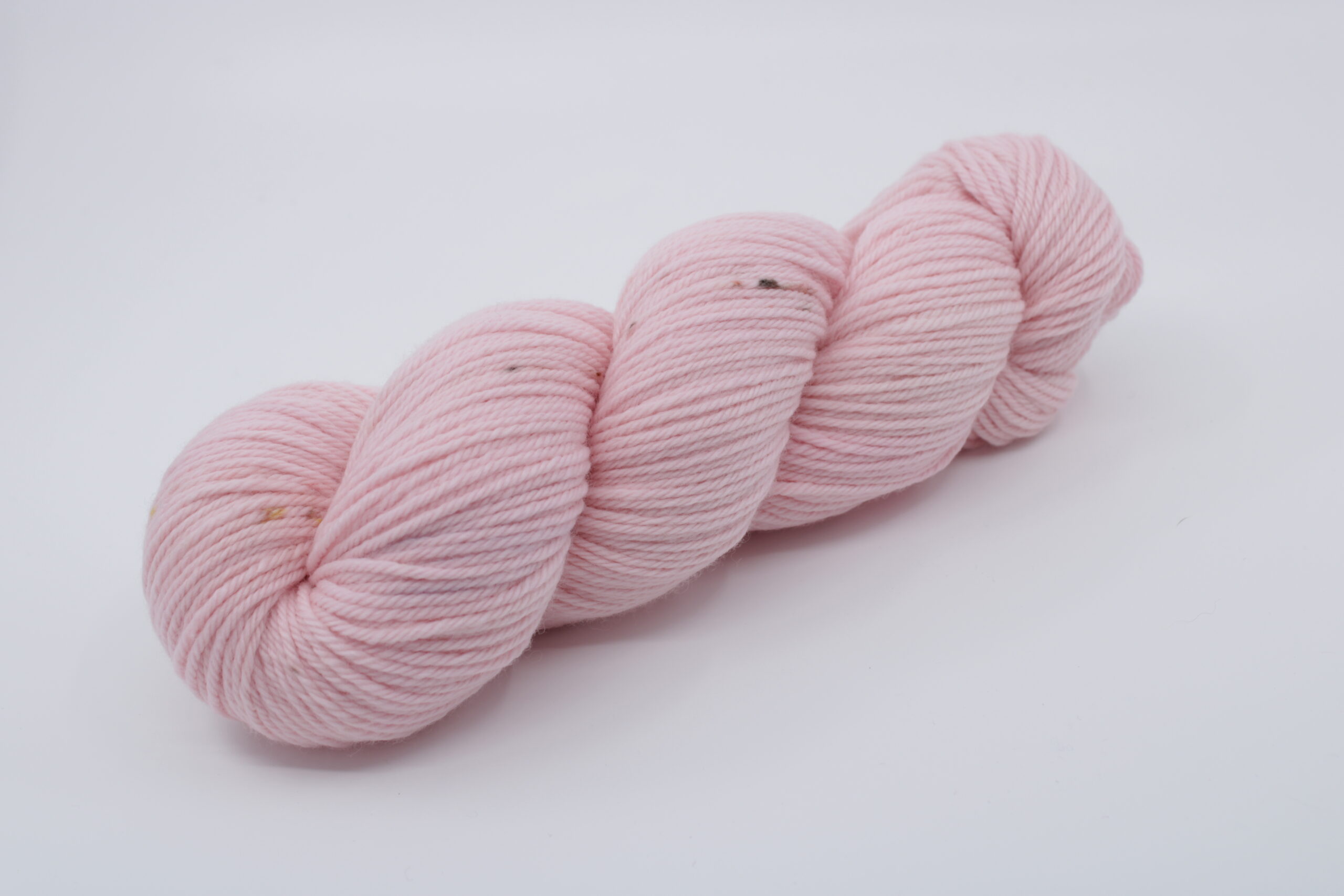 Fibrani wool, base: Flocon DK. 100% untreated merino wool, pink color with small speckles Color: OOAK