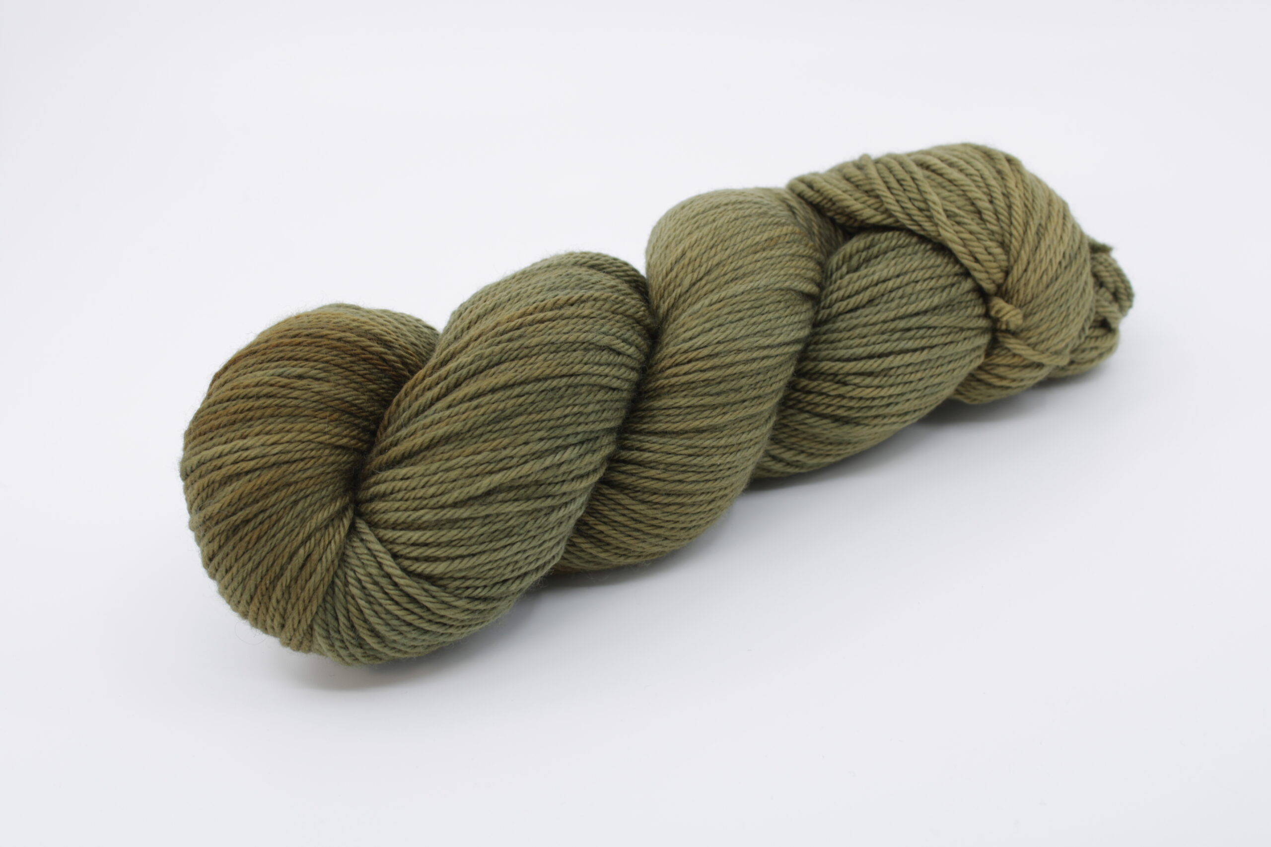 Fibrani wool, base: Flocon DK. 100% untreated merino wool, olive green color. Color: Olivia.