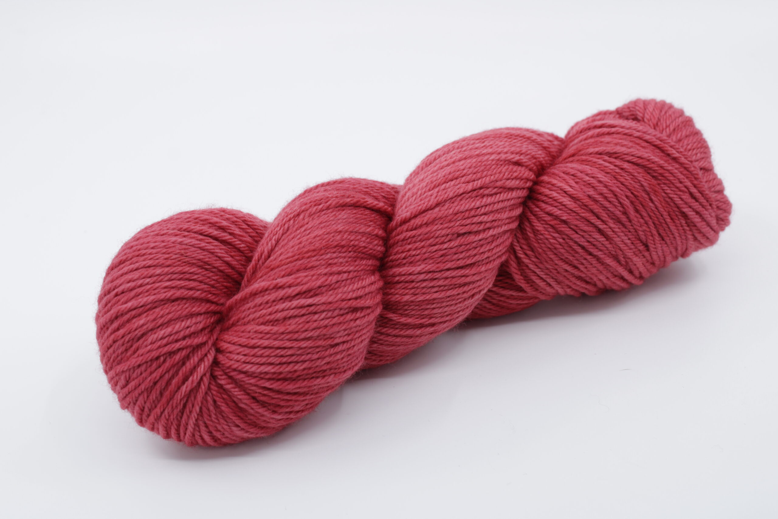 Fibrani wool, base: Flocon DK. Wool 100% merino untreated, red color. Color: Shani.