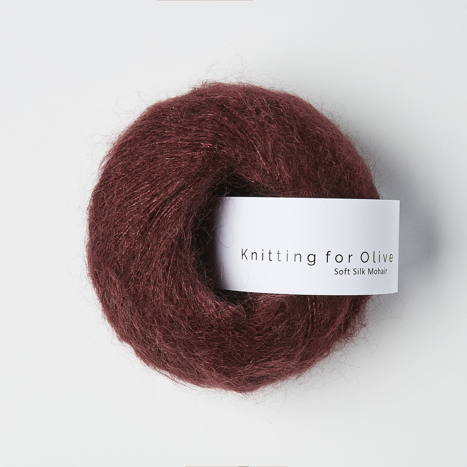 Knitting for olive soft silk mohair, le fil est composé de Kid mohair et soie de mûrier Poids de fils dentelle. Couleur bordeaux - Coloris: Bordeaux.